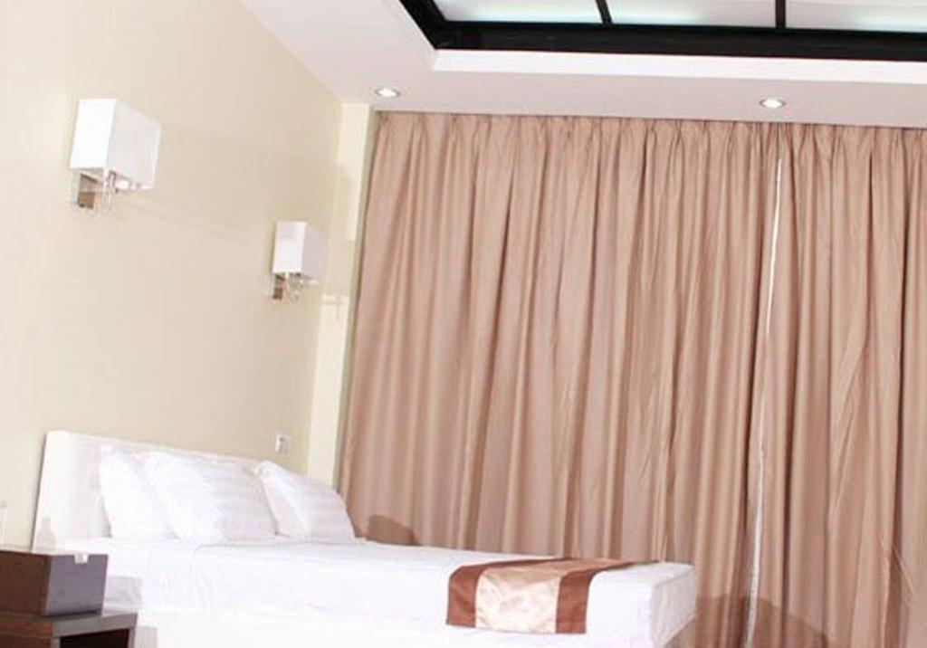 Sky Man Hotel Gyogon Szoba fotó